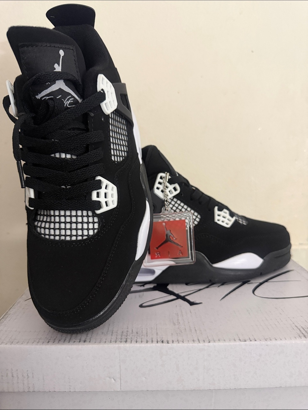 Jordan Men’s Black and White Retro Sneakers